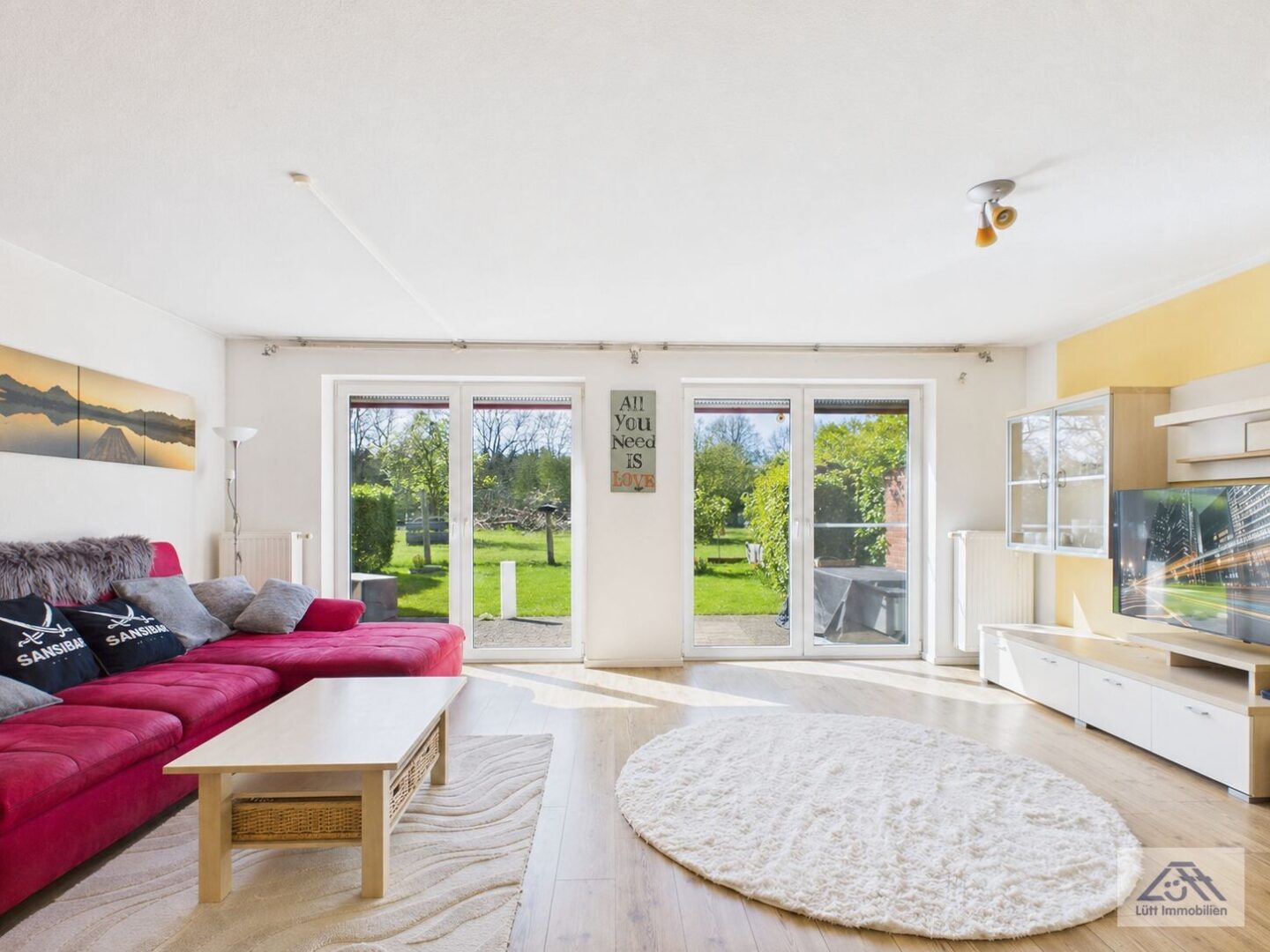 Wohnzimmer - Lütt Immobilien Kiel