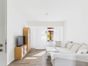 Wohnzimmer - Lütt Immobilien - Malente