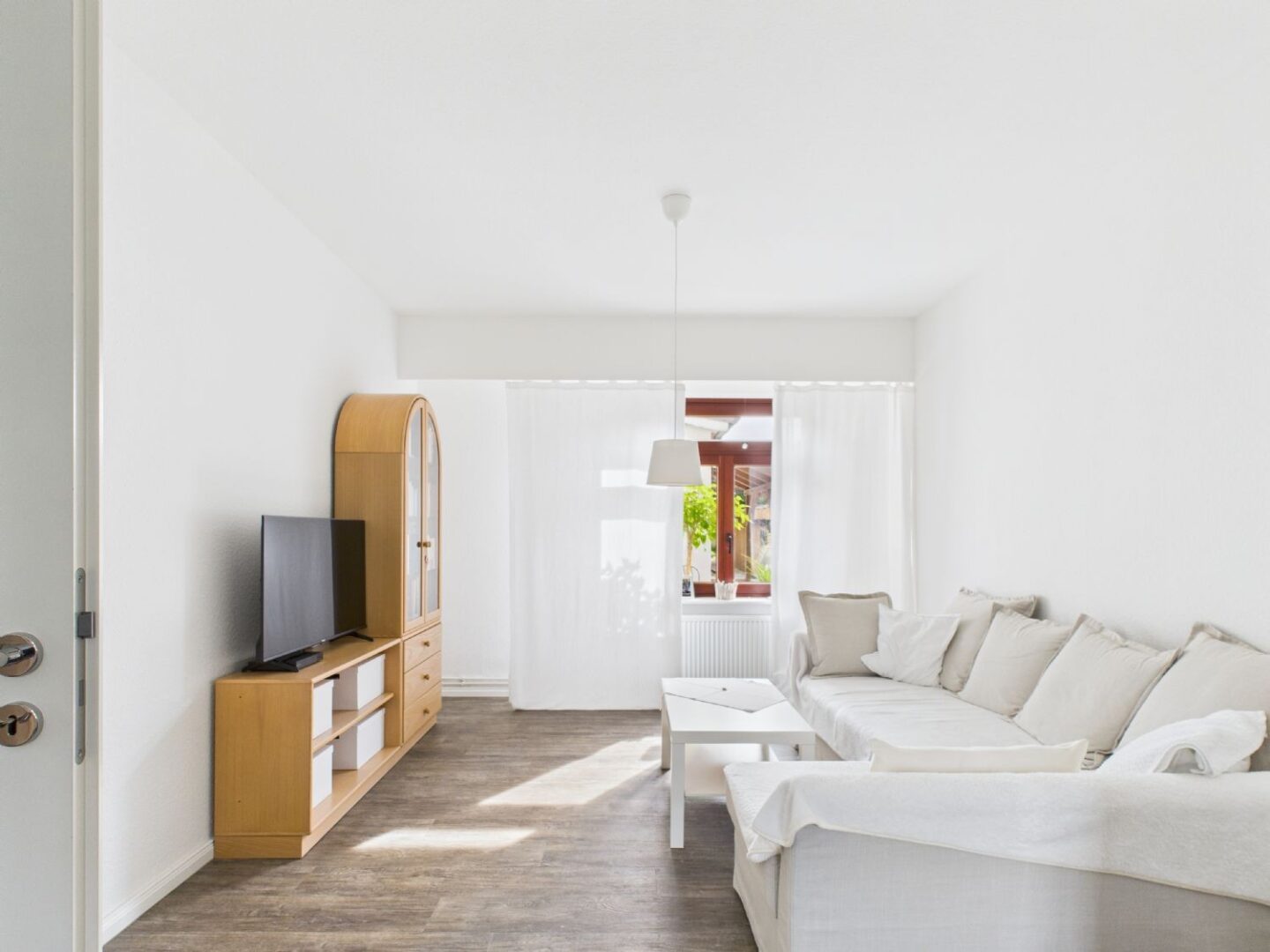 Wohnzimmer - Lütt Immobilien - Malente