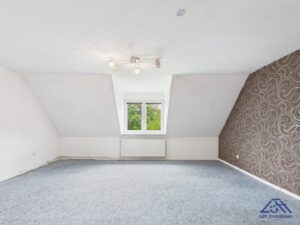 Zimmer DG - Lütt Immobilien - Selent.jpg