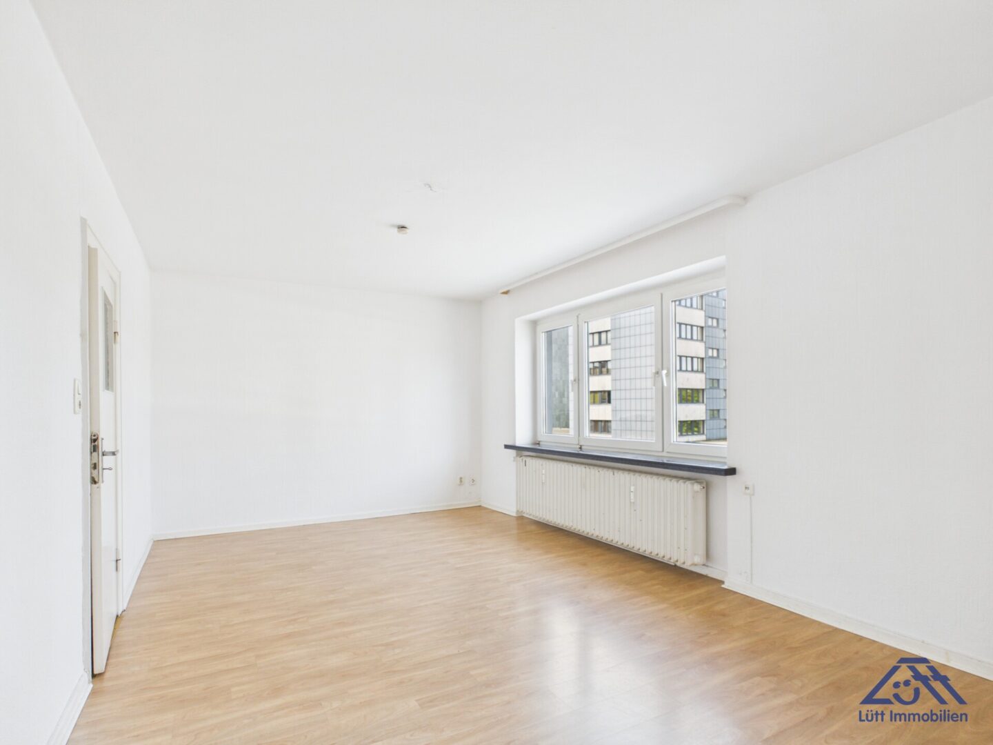 Wohnzimmer 1.1 - Lütt Immobilien - Kiel