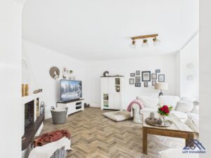 Wohnzimmer - Lütt Immobilien - Bönebüttel