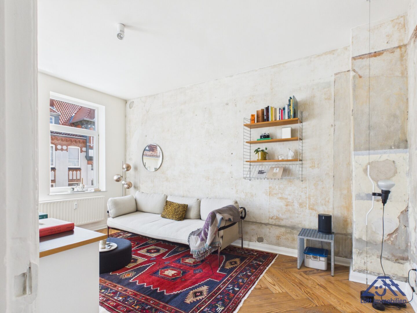 Wohnzimmer - Lütt Immobilien - Kiel