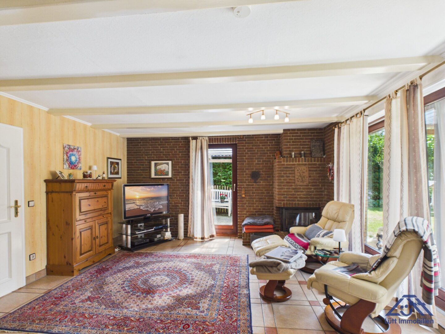 Kaminzimmer EG - Lütt Immobilien - Schackendorf