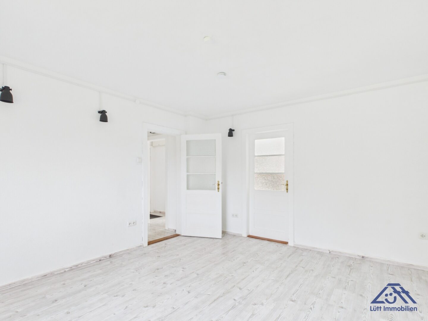 Wohnzimmer Eingang - Lütt Immobilien - Kiel