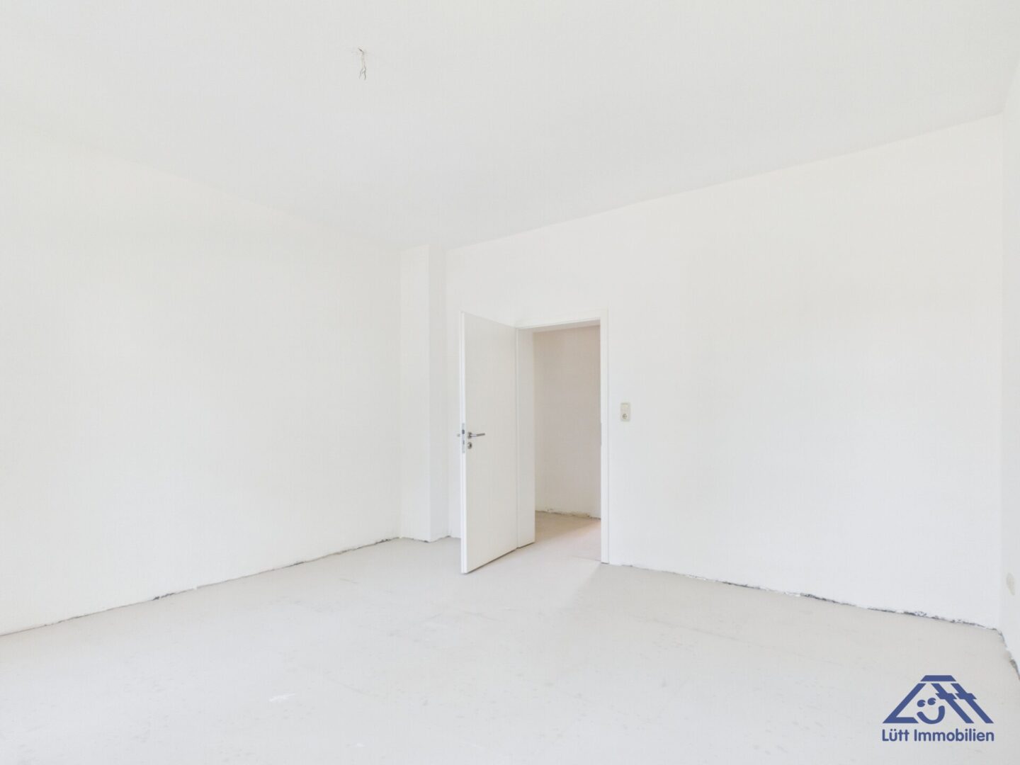 Wohnzimmer - Lütt Immobilien - Kiel