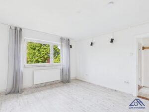 Wohnzimmer - Lütt Immobilien - Kiel