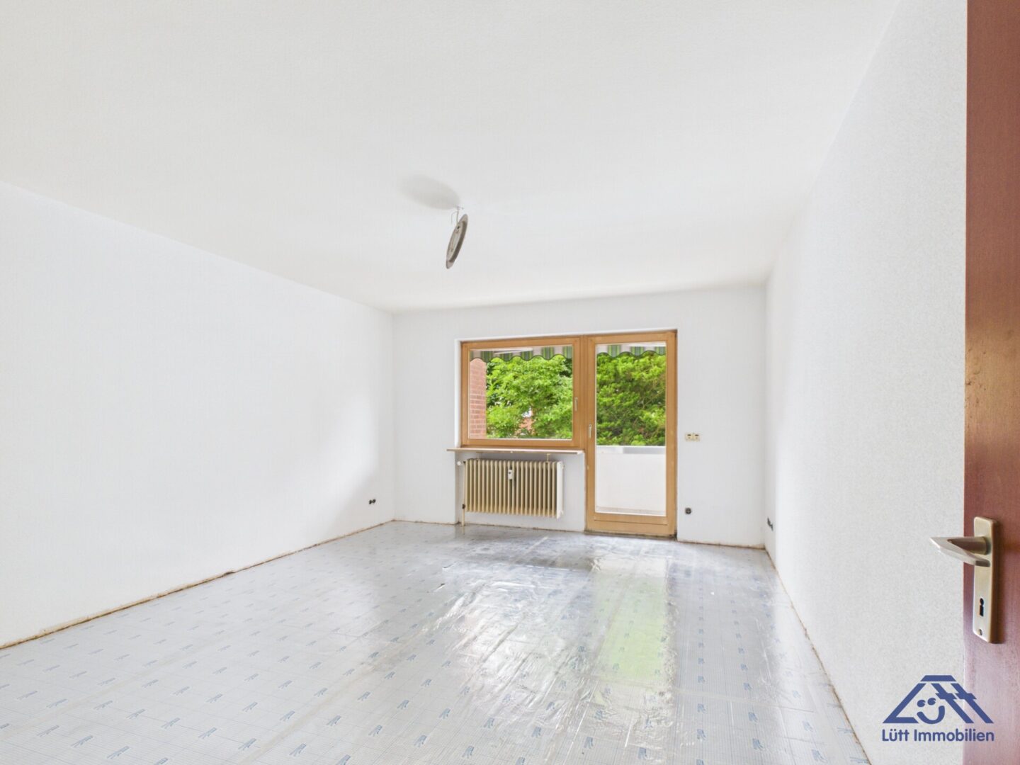 Wohnzimmer - Lütt Immobilien - Kiel