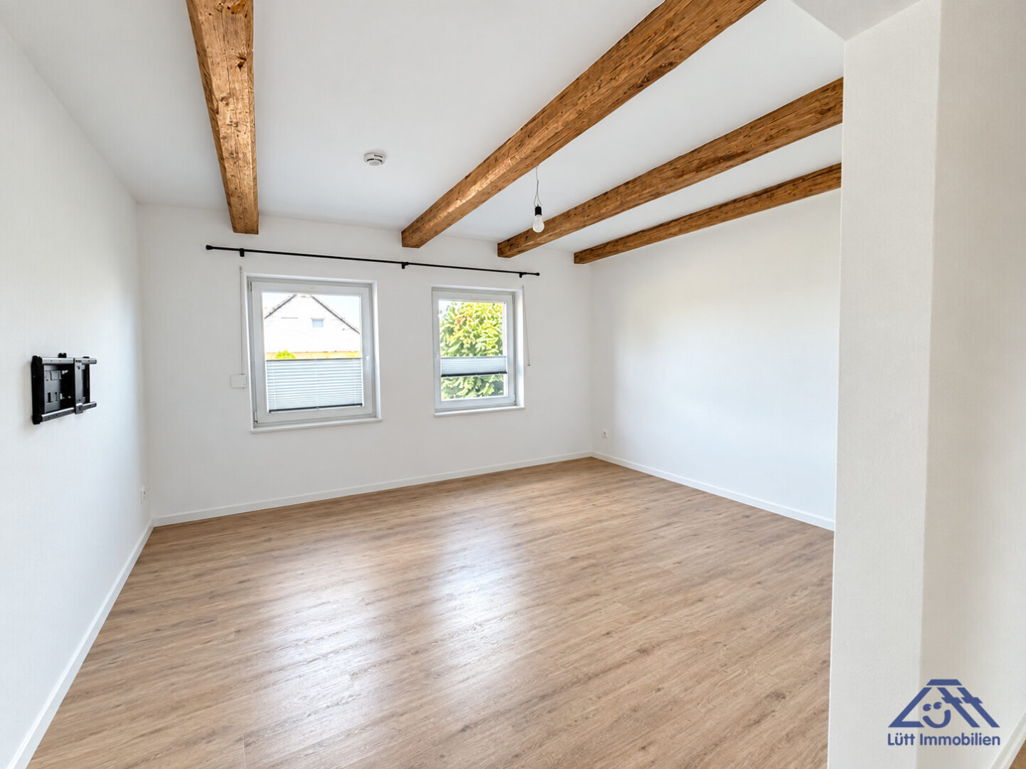Wohnzimmer - Lütt Immobilien Malente