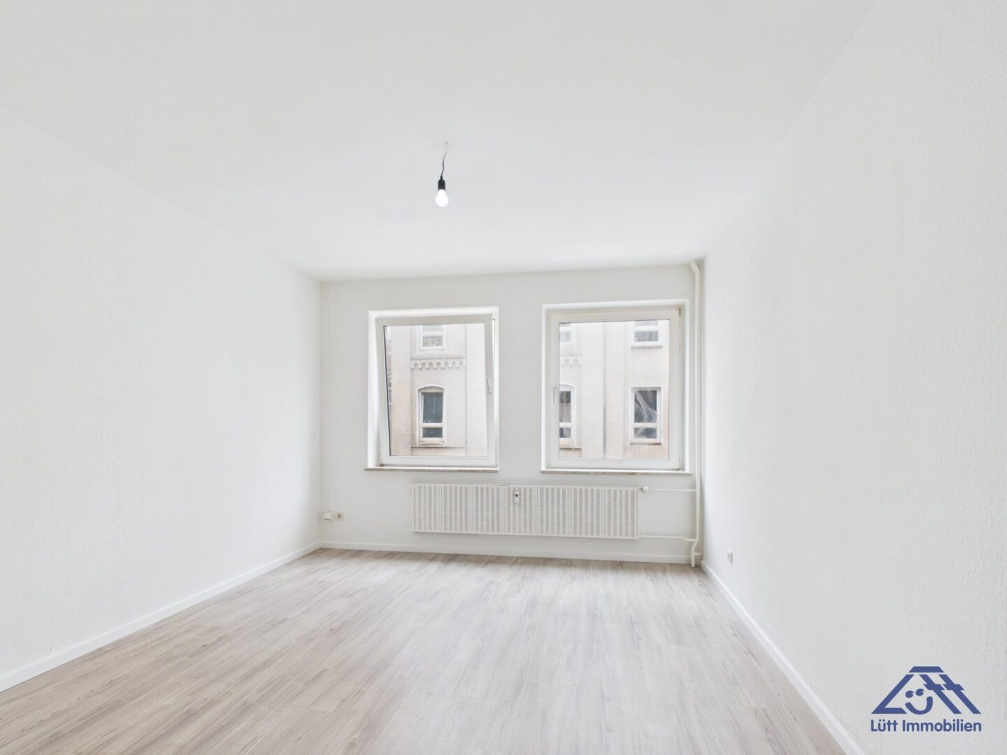 Wohnzimmer-Luett-Immobilien-Kiel-Gaarden