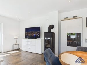 Wohnzimmer EG Kaminofen - Lütt Immobilien Selent