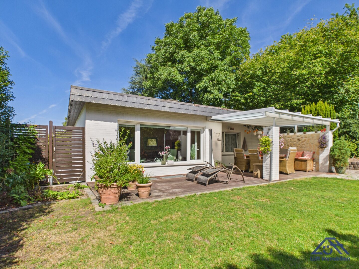 Garten Blick zur Terrasse - Lütt Immobilien - Kiel